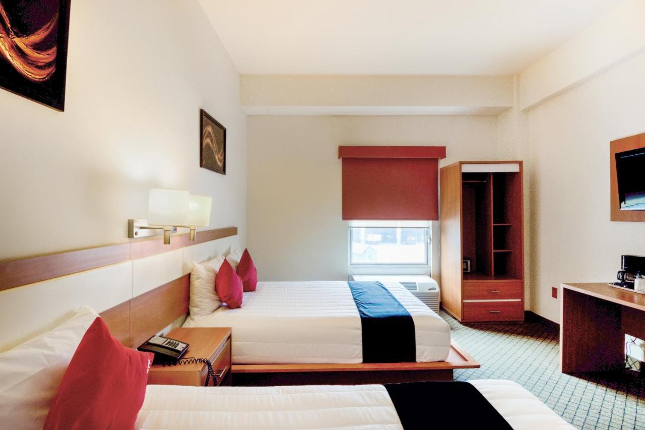 Capital O Hotel Herederos, Piedras Negras Extérieur photo
