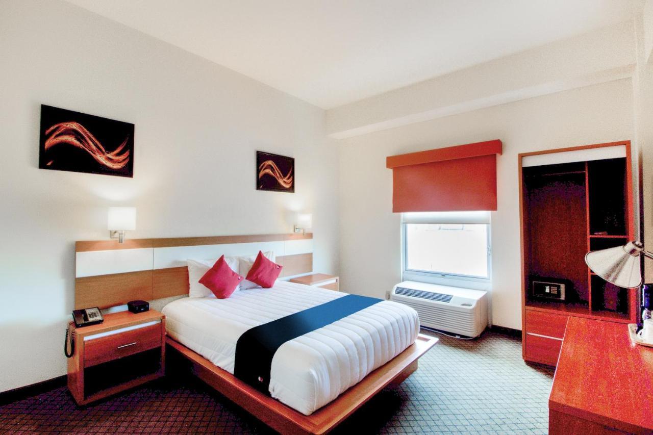Capital O Hotel Herederos, Piedras Negras Extérieur photo
