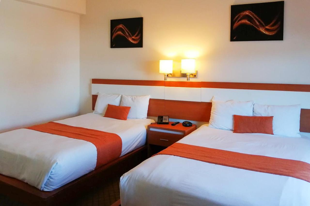 Capital O Hotel Herederos, Piedras Negras Extérieur photo
