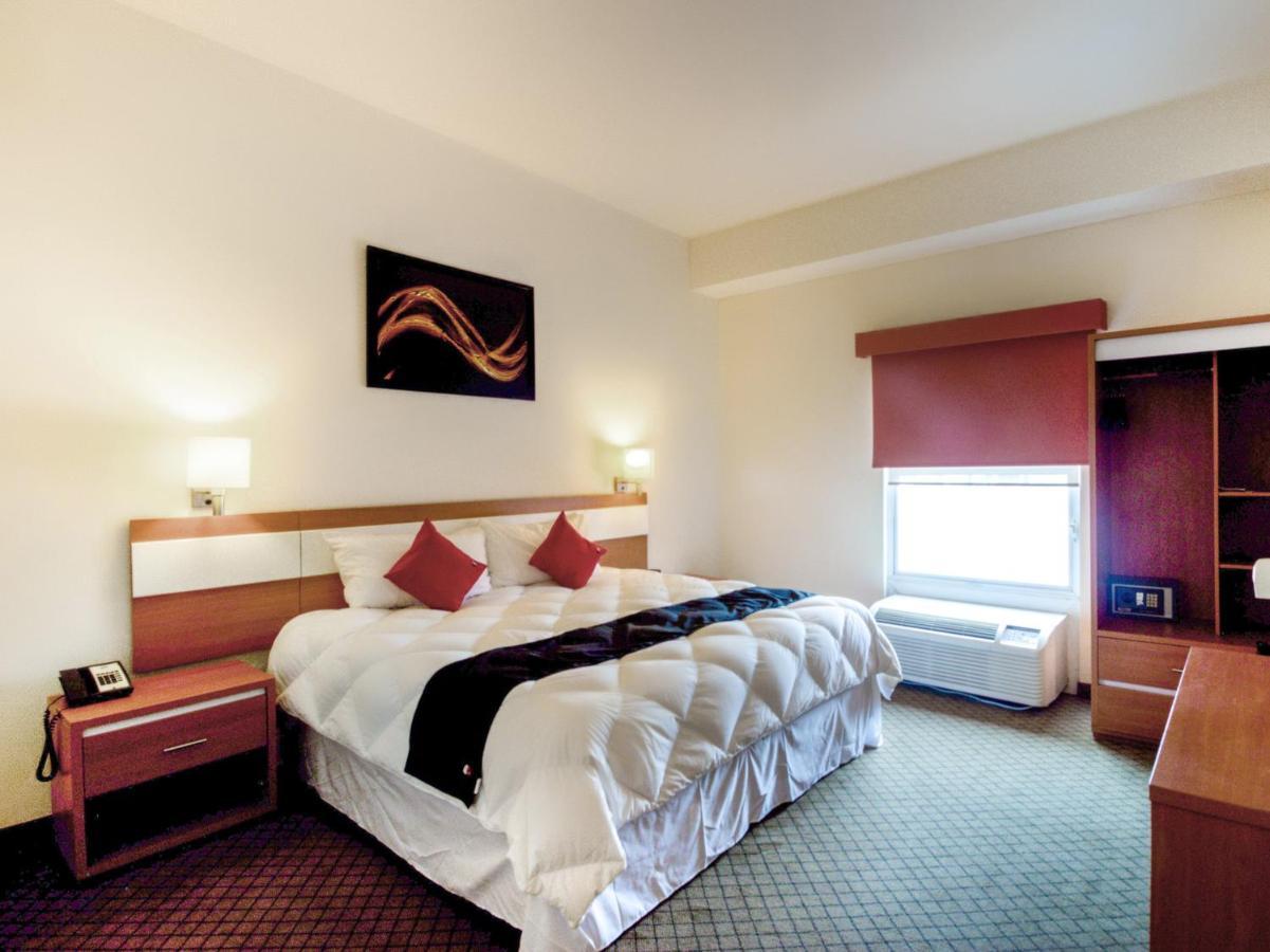 Capital O Hotel Herederos, Piedras Negras Extérieur photo